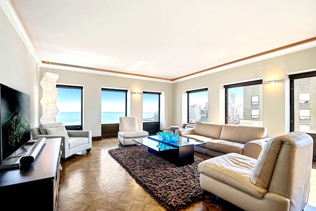 living area with baseboards and crown molding