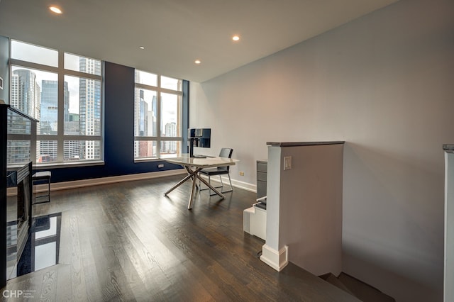 office space featuring dark wood finished floors, recessed lighting, and baseboards