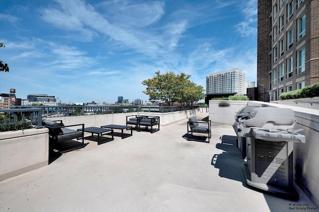 exterior space with a view of city and a patio area