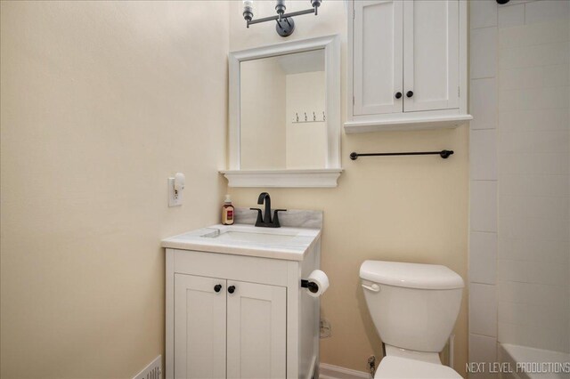 bathroom featuring a shower, a bathtub, vanity, and toilet