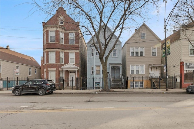 view of front of property with a fenced front yard