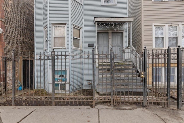 property entrance with fence