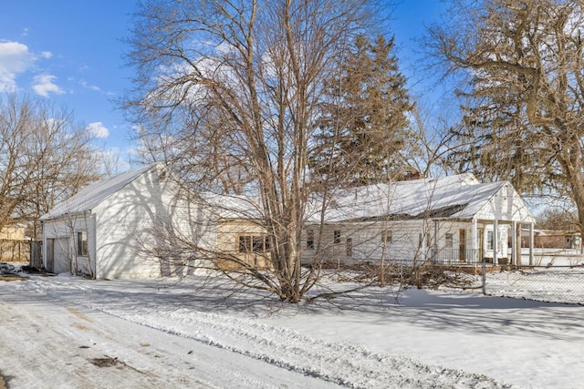 view of front of home with fence