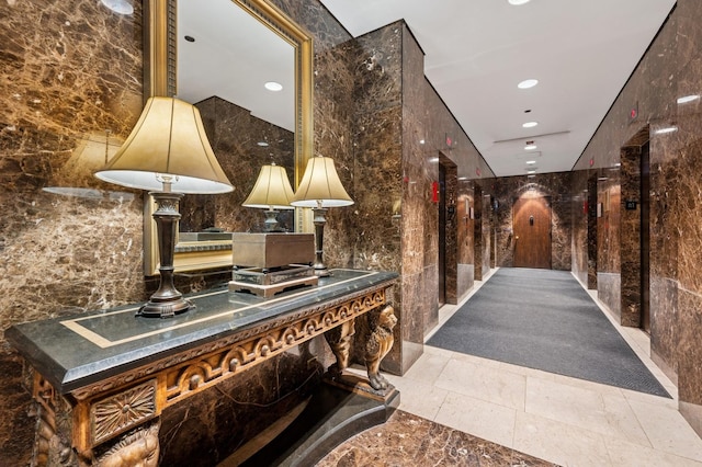 hallway with recessed lighting