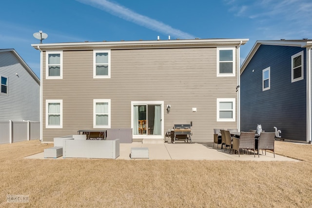 back of house featuring a patio area, fence, and a lawn