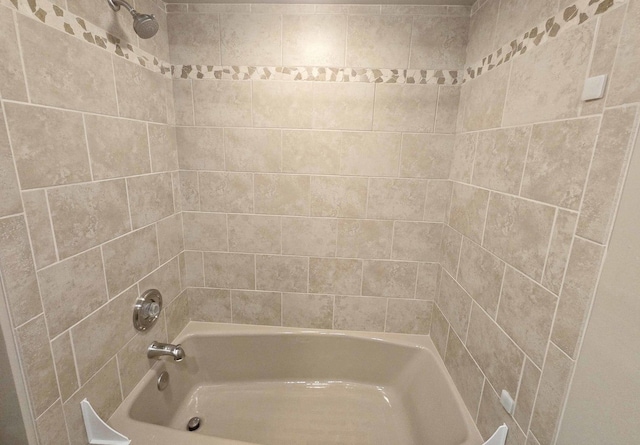 full bath featuring  shower combination