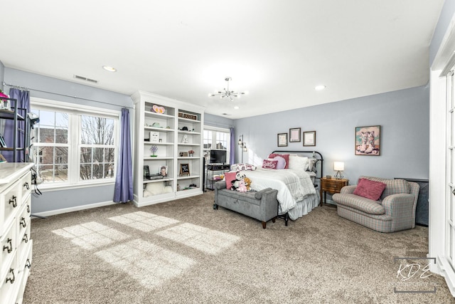 bedroom with recessed lighting, visible vents, a chandelier, and light colored carpet