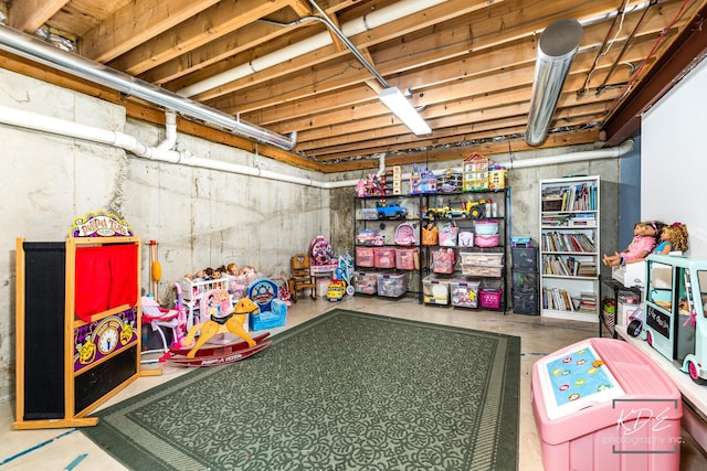 playroom featuring concrete floors