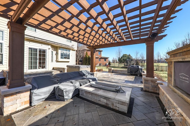 view of patio with fence, a hot tub, and a pergola