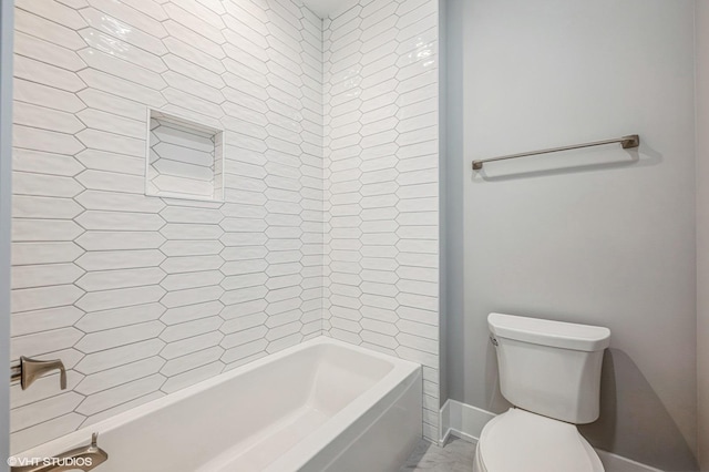 full bathroom with toilet and baseboards