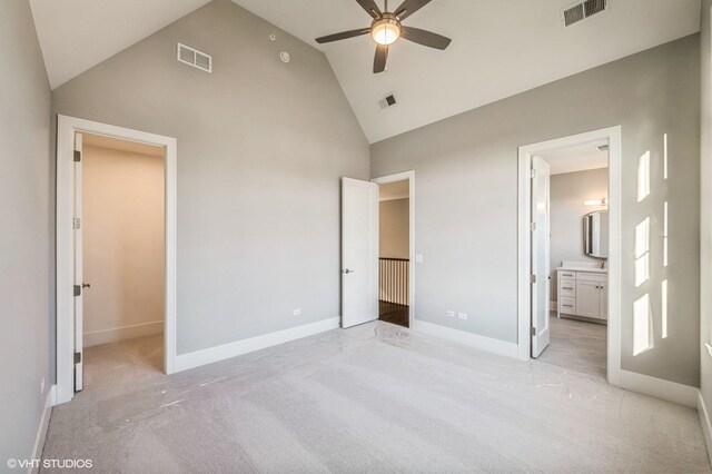 unfurnished bedroom with baseboards, visible vents, and light colored carpet