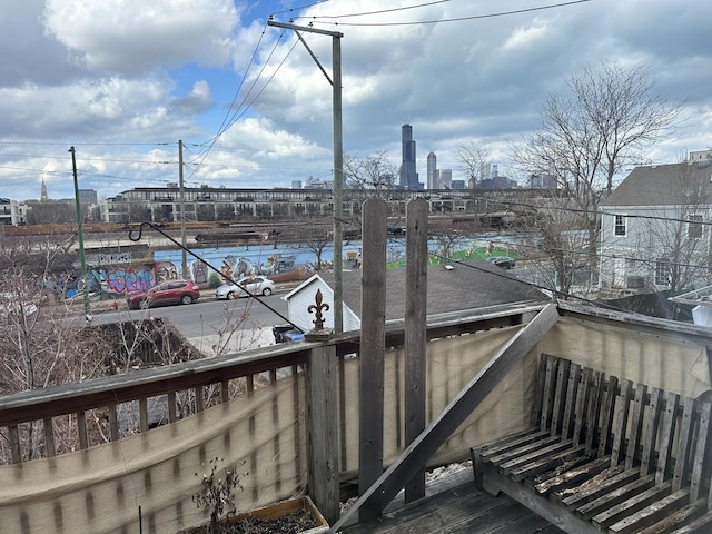 view of dock featuring a view of city