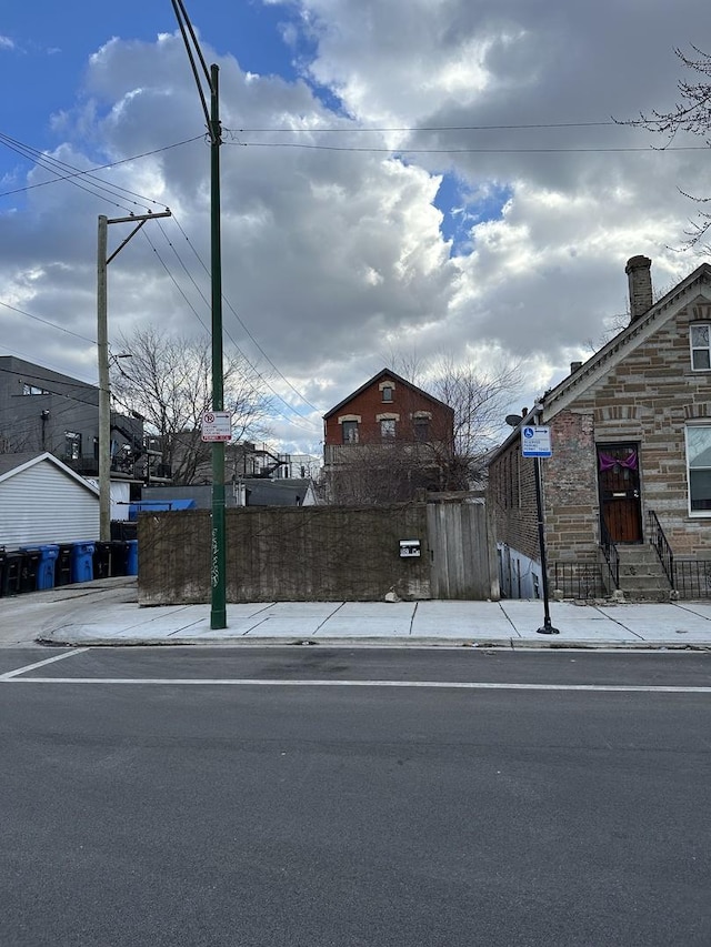 view of street with curbs and sidewalks