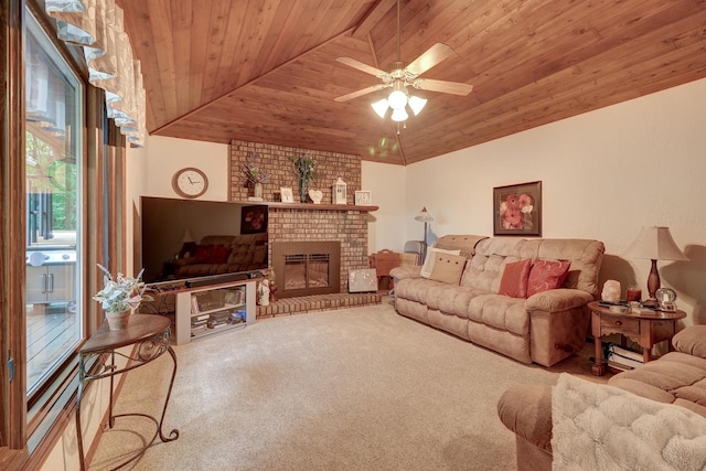 carpeted living room with lofted ceiling, a fireplace, wood ceiling, and a ceiling fan