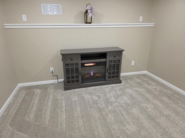 details featuring carpet, visible vents, and baseboards