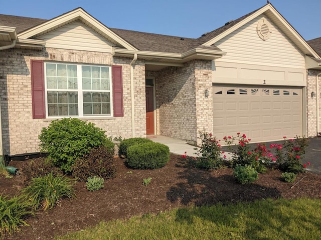 single story home featuring a garage, brick siding, and roof with shingles