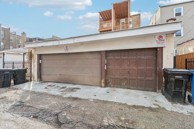 garage featuring fence