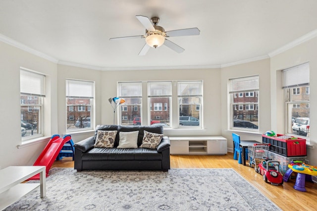 sunroom / solarium with ceiling fan