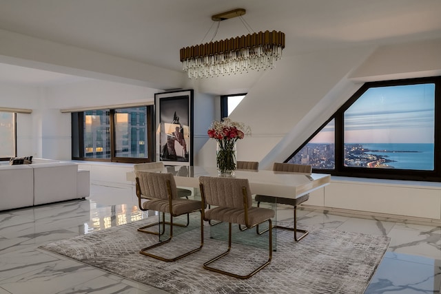 dining room featuring marble finish floor