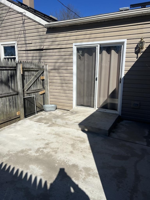 view of patio with fence