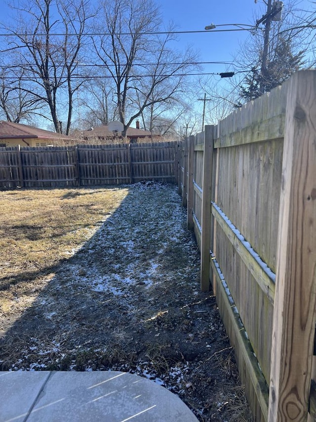 view of yard with a fenced backyard