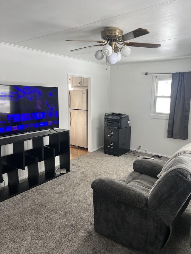 living room featuring ceiling fan and carpet floors