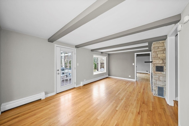 unfurnished living room with a baseboard heating unit, a stone fireplace, and beam ceiling