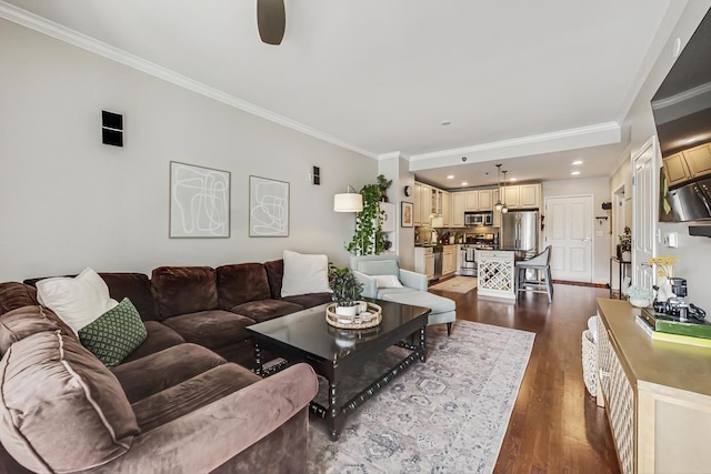 living area with dark wood-style floors, recessed lighting, and crown molding