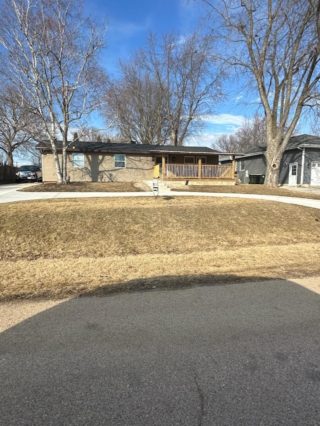 view of yard with covered porch