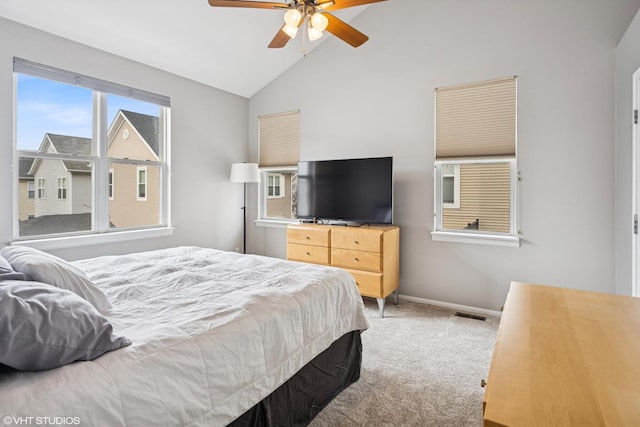 bedroom with visible vents, baseboards, lofted ceiling, ceiling fan, and carpet flooring