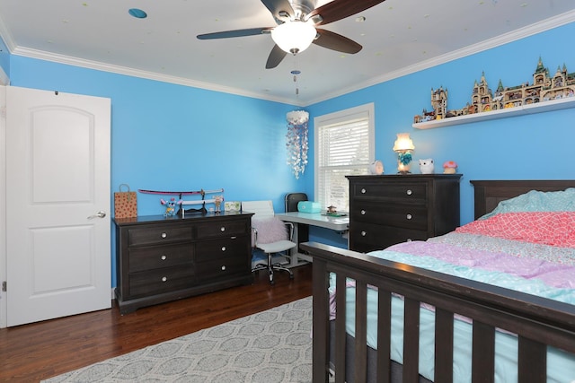 bedroom with crown molding, a ceiling fan, and dark wood-style flooring