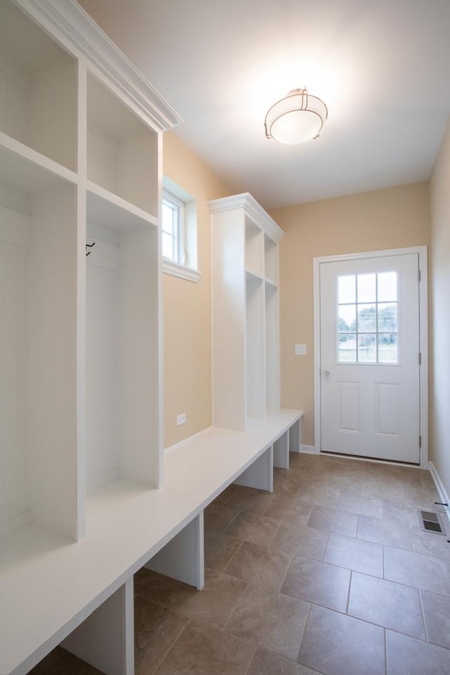 mudroom with visible vents and baseboards