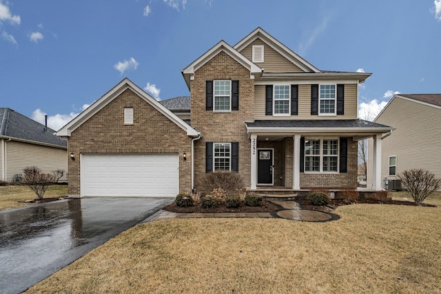 view of front of home with central AC unit, driveway, an attached garage, a front lawn, and brick siding