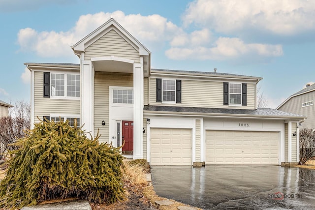 view of front facade featuring driveway and a garage