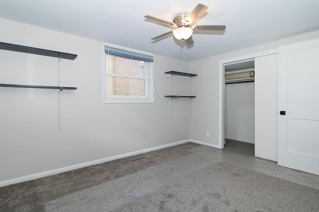 unfurnished bedroom with a closet, carpet, a ceiling fan, and baseboards