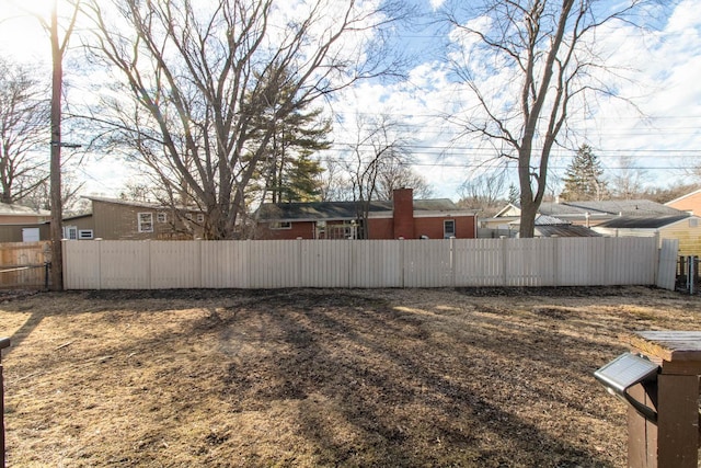 view of yard featuring fence