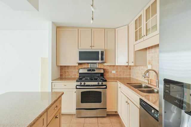400 E Randolph St Unit 1824, Chicago, IL 60601 - kitchen with appliances with stainless steel finishes, decorative backsplash, cream cabinetry, and a sink