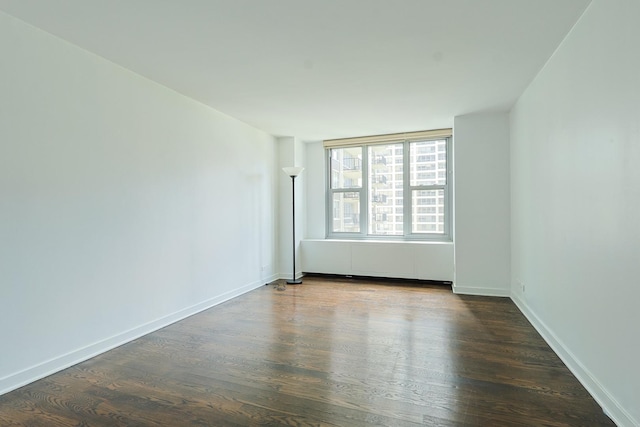 400 E Randolph St Unit 1824, Chicago, IL 60601 - empty room featuring baseboards and dark wood-style floors