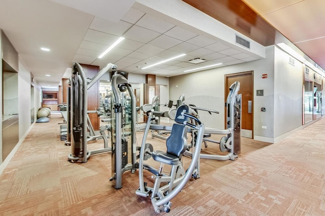 400 E Randolph St Unit 1824, Chicago, IL 60601 - workout area featuring baseboards, visible vents, and light colored carpet