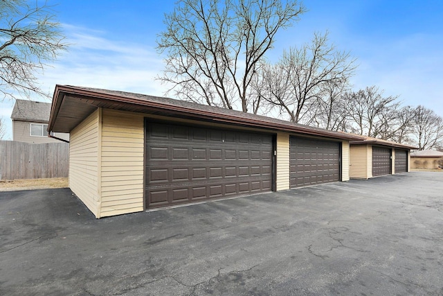 garage featuring fence