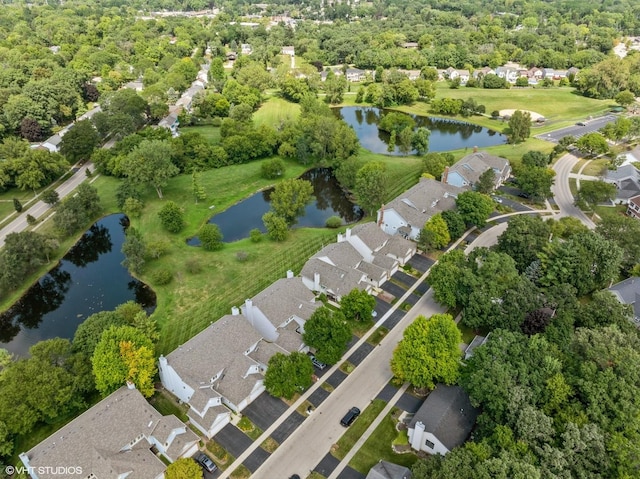 birds eye view of property featuring a water view and a residential view