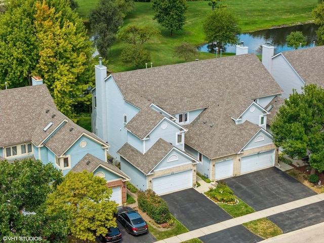 bird's eye view with a water view