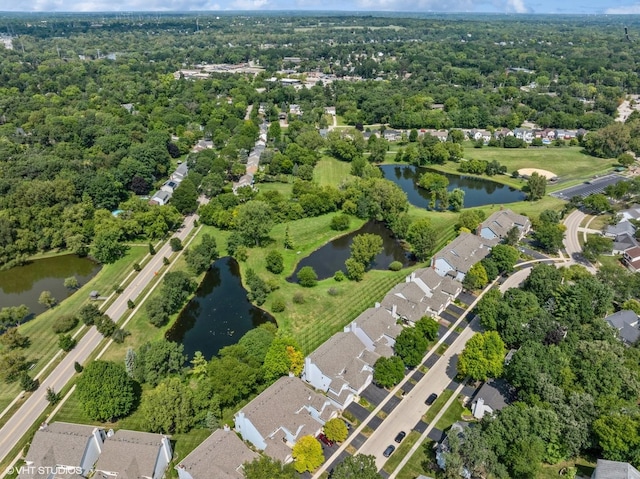 aerial view with a residential view and a water view