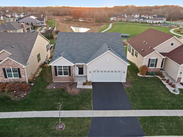 drone / aerial view featuring a residential view