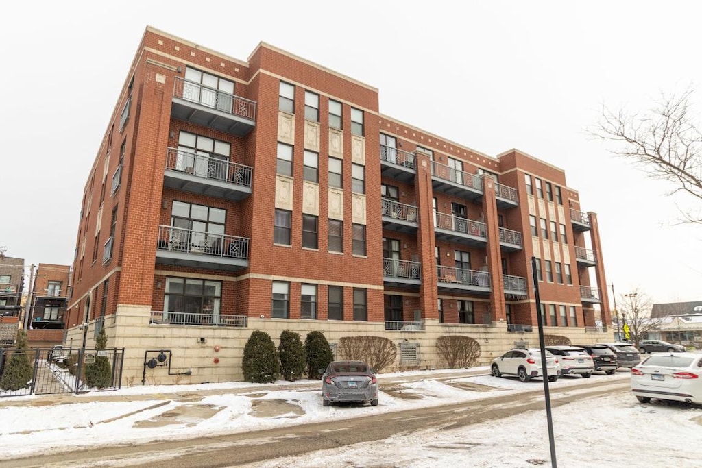 4011 N Francisco Ave Unit 201, Chicago, IL 60618 - view of snow covered property