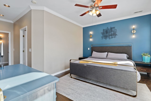 bedroom featuring baseboards, visible vents, dark wood-type flooring, crown molding, and recessed lighting