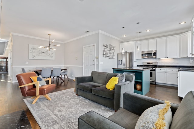 living room featuring ornamental molding, recessed lighting, dark wood finished floors, and baseboards