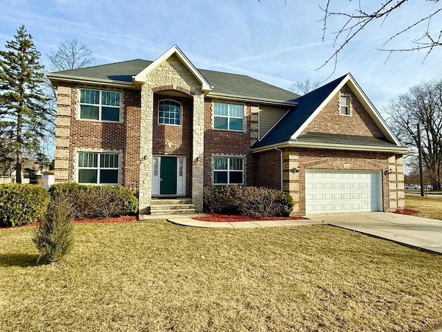 view of front of home featuring a front lawn, a garage, brick siding, and driveway