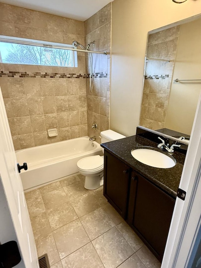 full bathroom featuring visible vents, shower / tub combination, vanity, and toilet