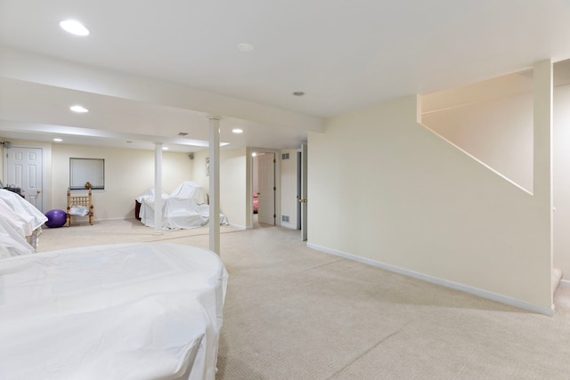 bedroom with light carpet, baseboards, and recessed lighting